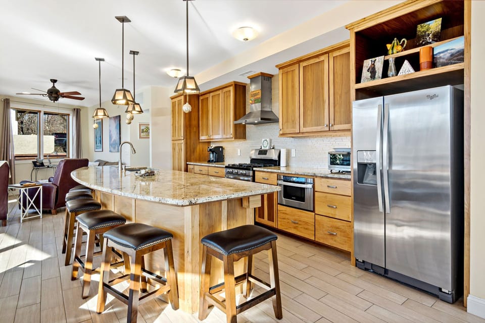Cook like you're at home with stainless steel appliances, a gas range, and tons of counter space for prepping meals or snacks.