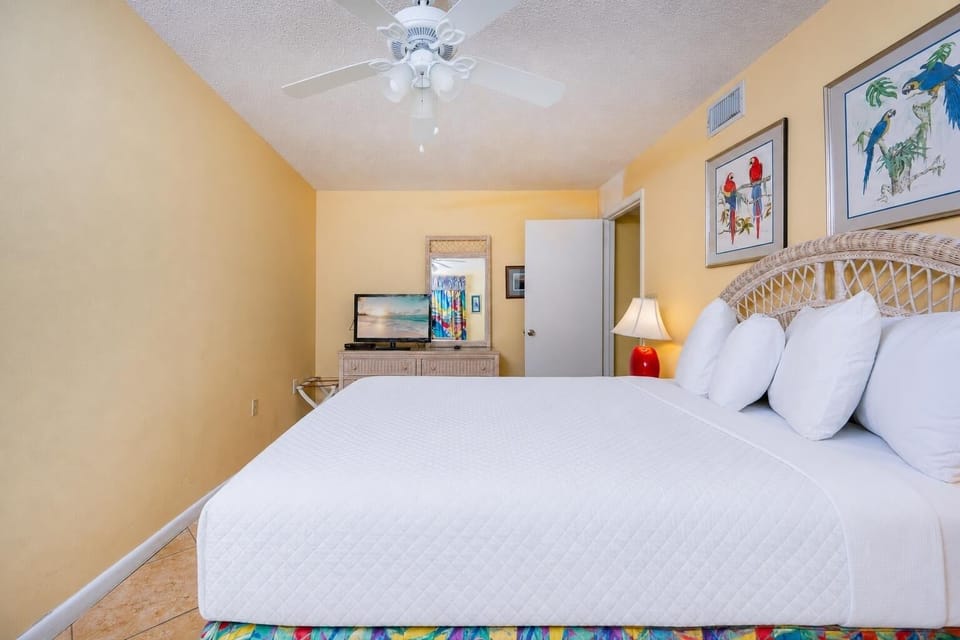 A guest suite invites you to unwind on the soft queen bed while streaming your favorite show