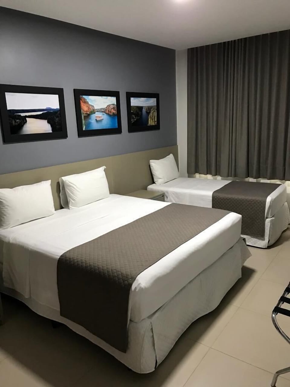 Standard Triple Room | Pillowtop beds, blackout drapes, free WiFi
