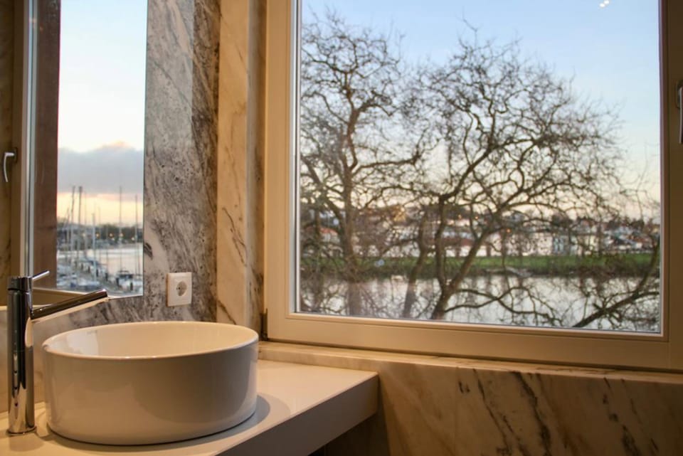 Shower, bidet, towels, soap
