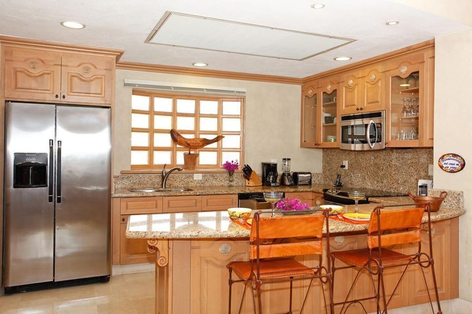 Kitchen with granite and stainless appliances