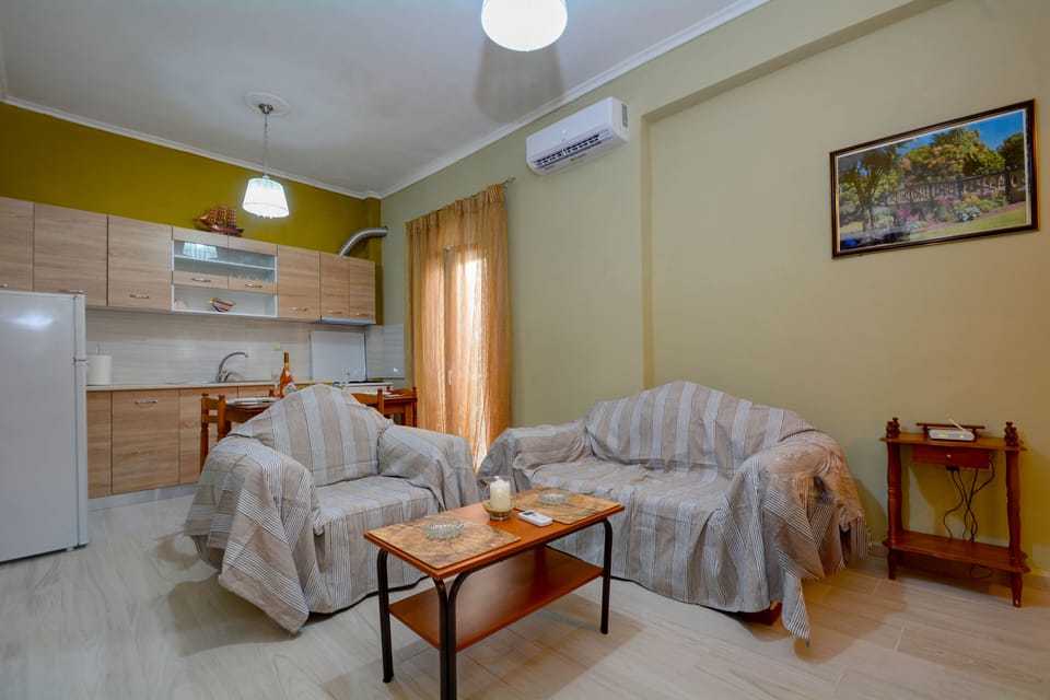 Apartment, 2 Bedrooms | Living room | Flat-screen TV