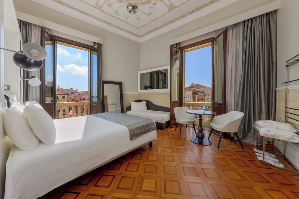 Junior Double/Triple Suite | Premium bedding, down comforters, pillowtop beds, minibar
