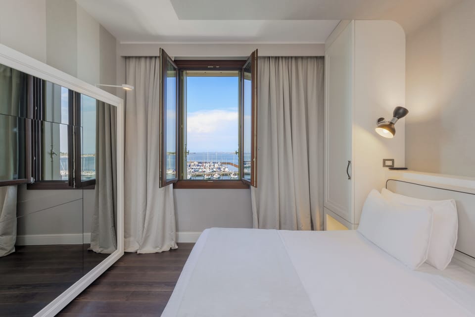 Deluxe Double Room, Lagoon View | Premium bedding, down comforters, pillowtop beds, minibar