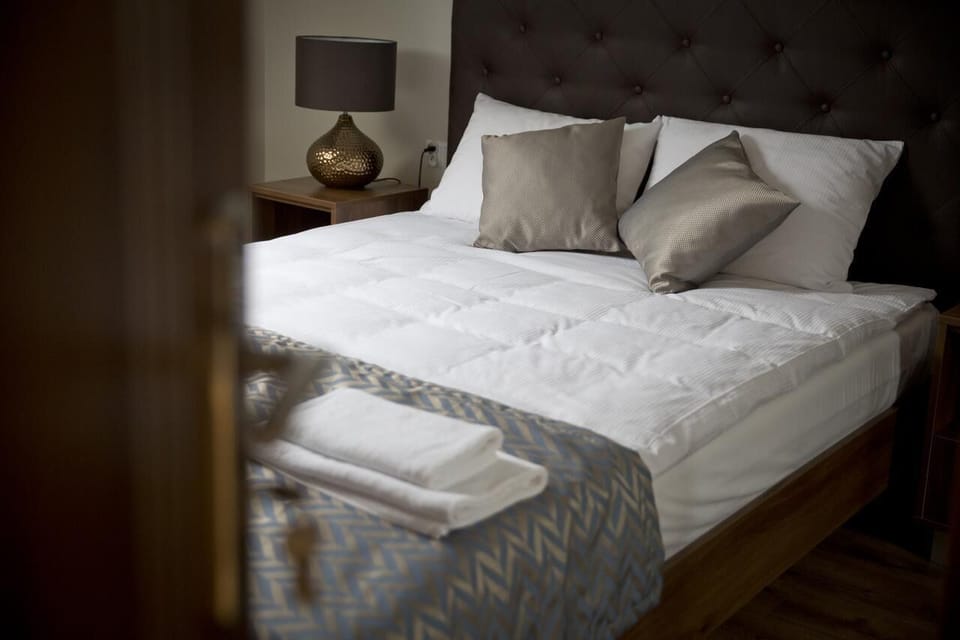 Suite, 2 Bedrooms | In-room safe, desk, blackout drapes, iron/ironing board