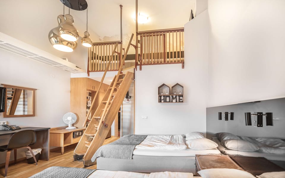 Family Room, Multiple Beds, Non Smoking | In-room safe, desk, blackout drapes, iron/ironing board