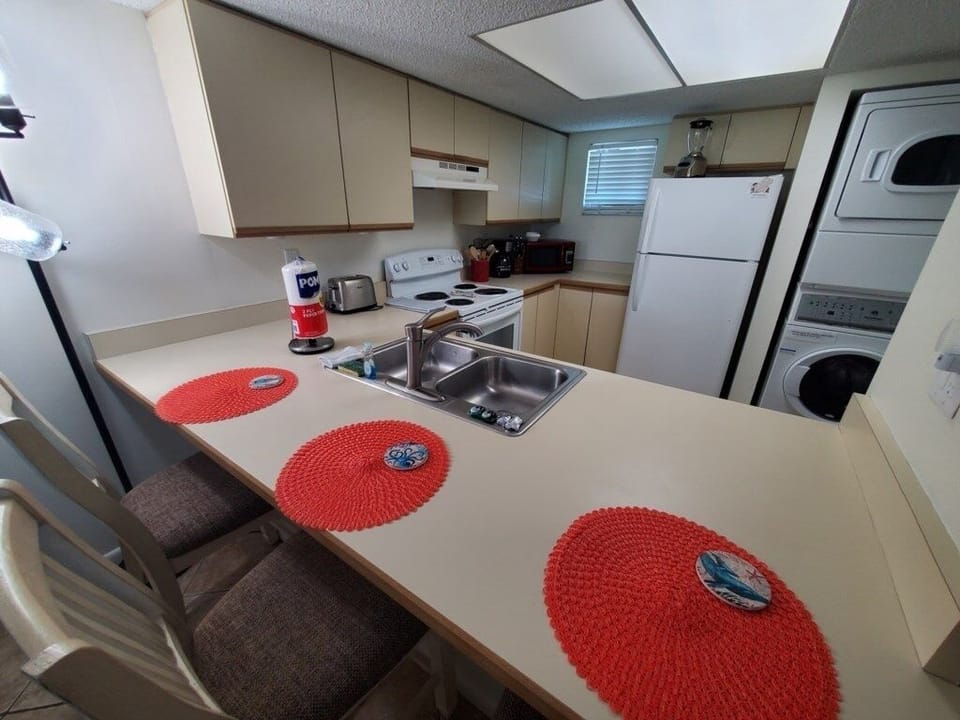 Condo, 2 Bedrooms | Private kitchen | Microwave, dishwasher, cookware/dishes/utensils