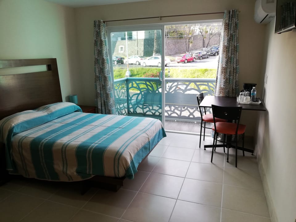 Laptop workspace, iron/ironing board, free WiFi, bed sheets