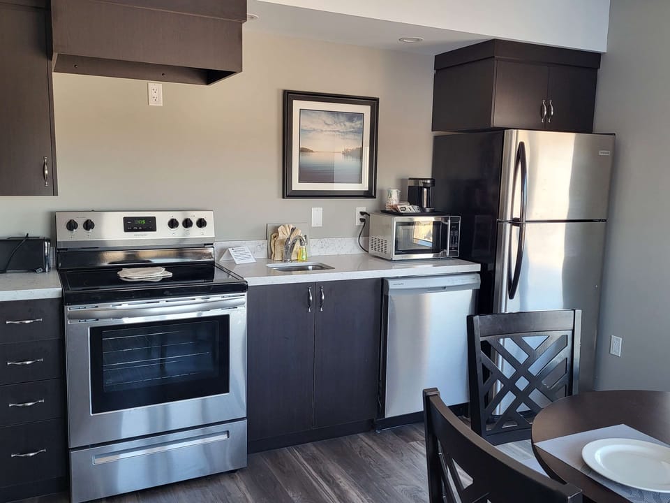 Suite, 2 Queen Beds, Non Smoking | Private kitchenette | Microwave, coffee/tea maker