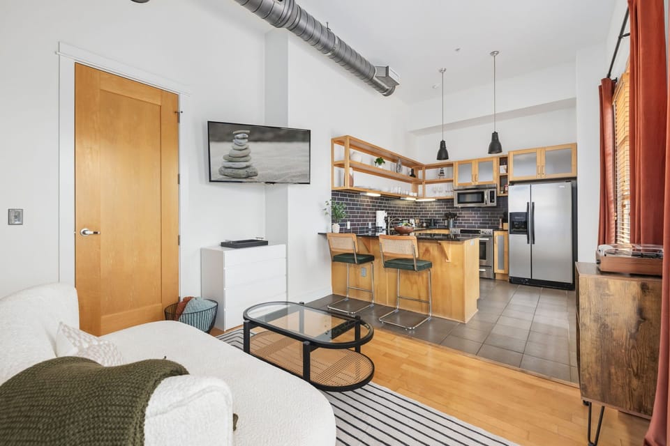 Open-concept living flows seamlessly into the modern kitchen.
