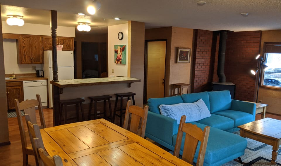 Open concept kitchen, dining and living room. 