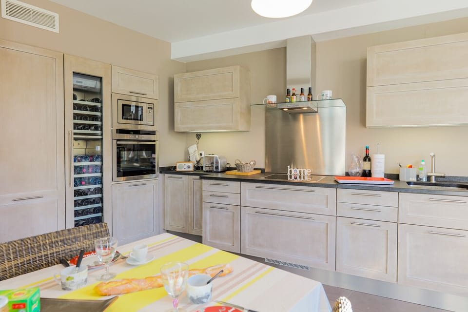 THE DINING ROOM WITH KITCHEN VIEW