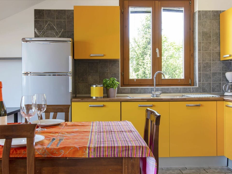 Countertop, Room, Furniture, Kitchen, Orange, Cabinetry, Yellow, Interior Design, Property, Floor