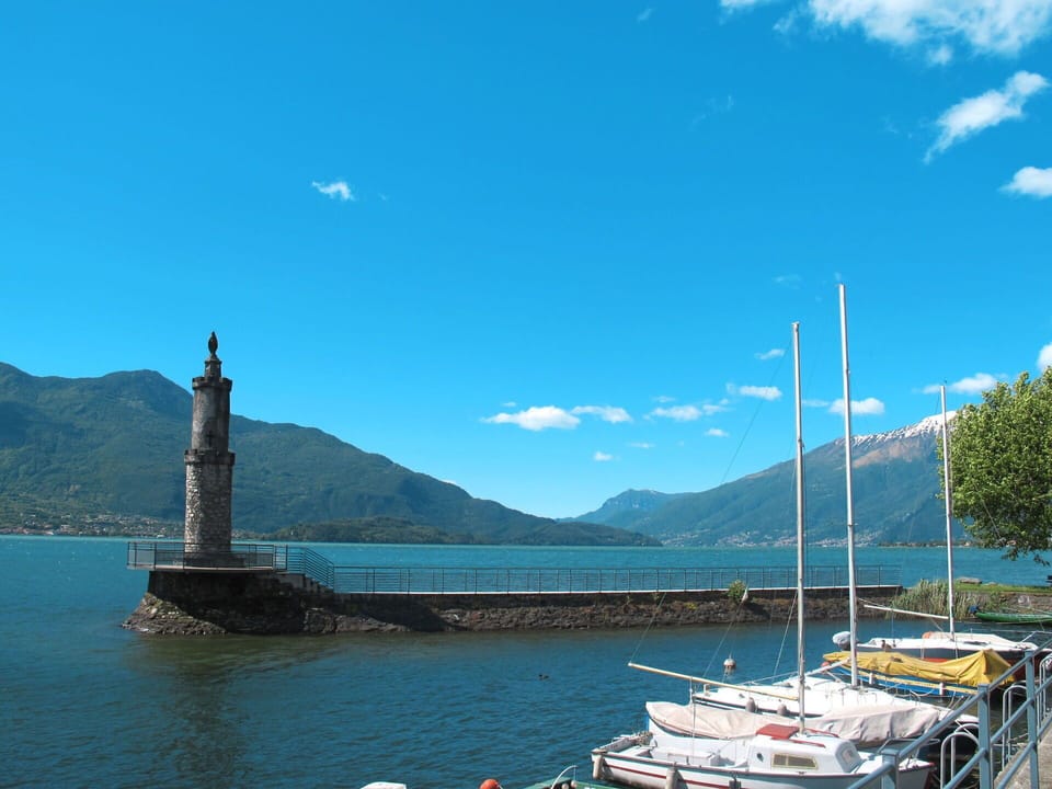 Water, Sky, Cloud, Mountain, Boat, Azure, Watercraft, Lake, Body Of Water