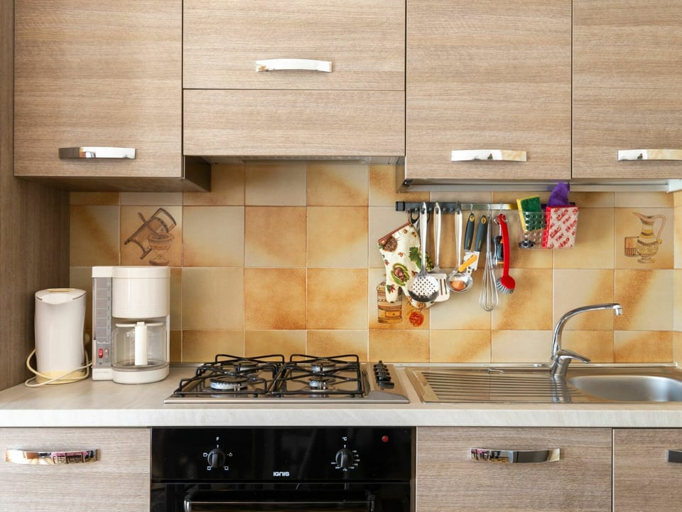 Cabinetry, Countertop, Property, Sink, White, Kitchen Appliance, Kitchen, Kitchen Stove, Gas Stove, Interior Design