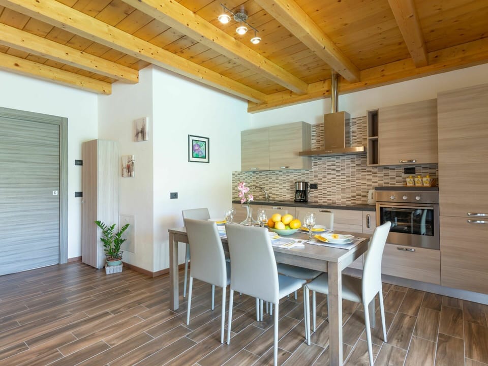 Table, Furniture, Property, Countertop, Wood, Chair, Interior Design, Floor, Houseplant, Flooring