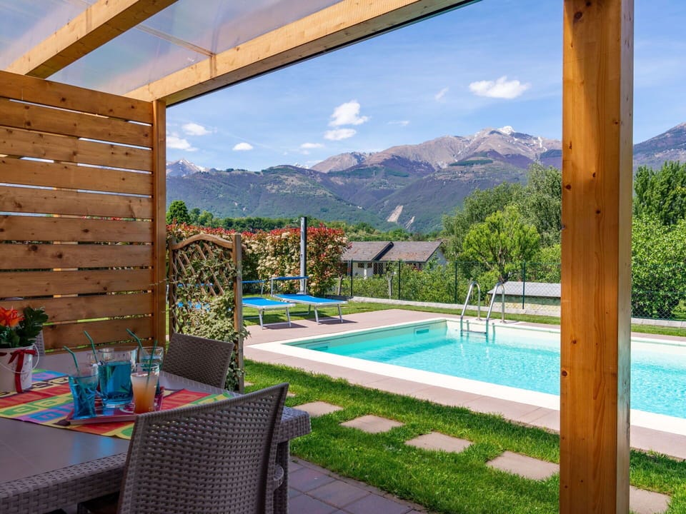 Cloud, Plant, Property, Table, Building, Sky, Furniture, Chair, Window, Swimming Pool