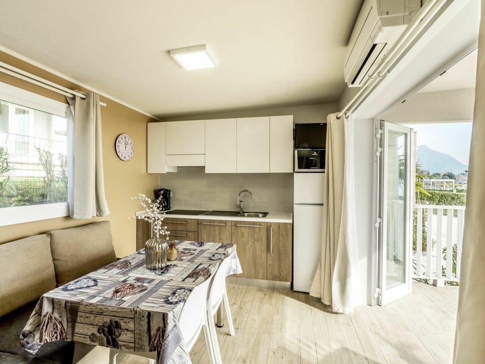 Countertop, Cabinetry, Window, Table, Building, Wood, Living Room, Kitchen, Floor, Plant