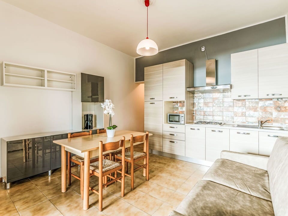 Flooring, Interior Design, Furniture, Kitchen, Floor, Cabinetry, Ceiling, Countertop, Wood, Kitchen Appliance