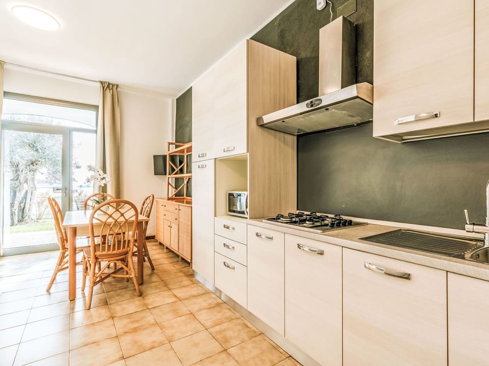 Kitchen, Interior Design, Flooring, Countertop, Major Appliance, Ceiling, Kitchen Appliance, Cabinetry, Floor, Room