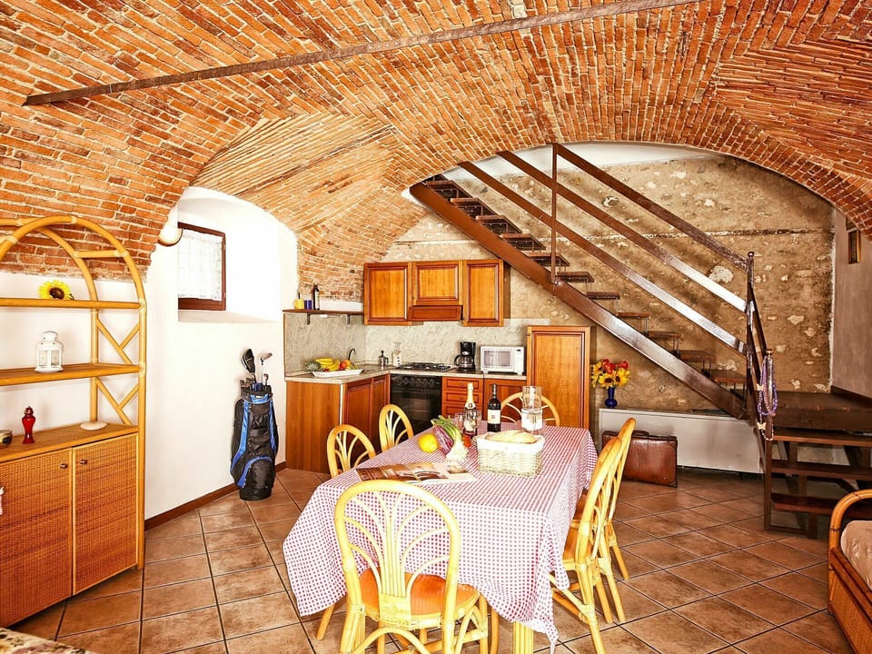 Furniture, Table, Property, Chair, Wood, Lighting, Building, Interior Design, Brick, Cabinetry