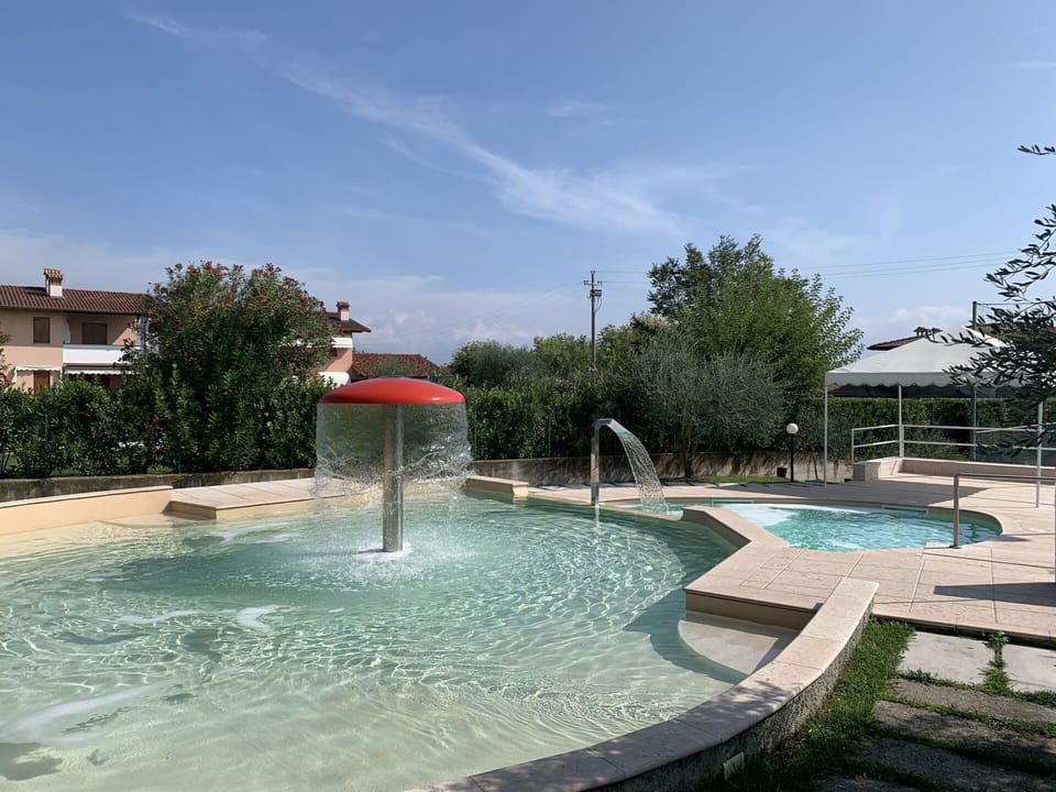Water, Sky, Cloud, Water Resources, Property, Tree, Swimming Pool, Plant, Leisure, Composite Material