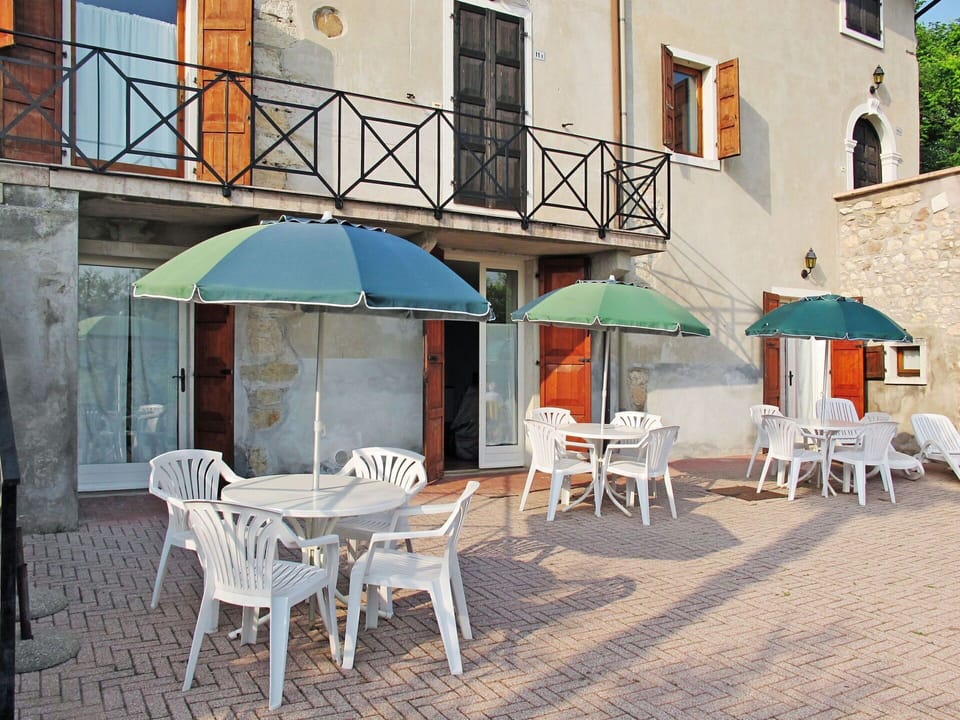 Table, Furniture, Property, Window, Building, Umbrella, Chair, Outdoor Table, Azure, Shade