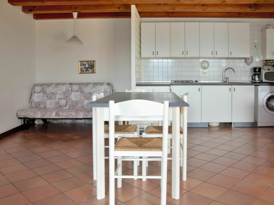 Furniture, Cabinetry, Property, Countertop, Building, Kitchen Appliance, Wood, Kitchen Stove, Interior Design, Gas Stove