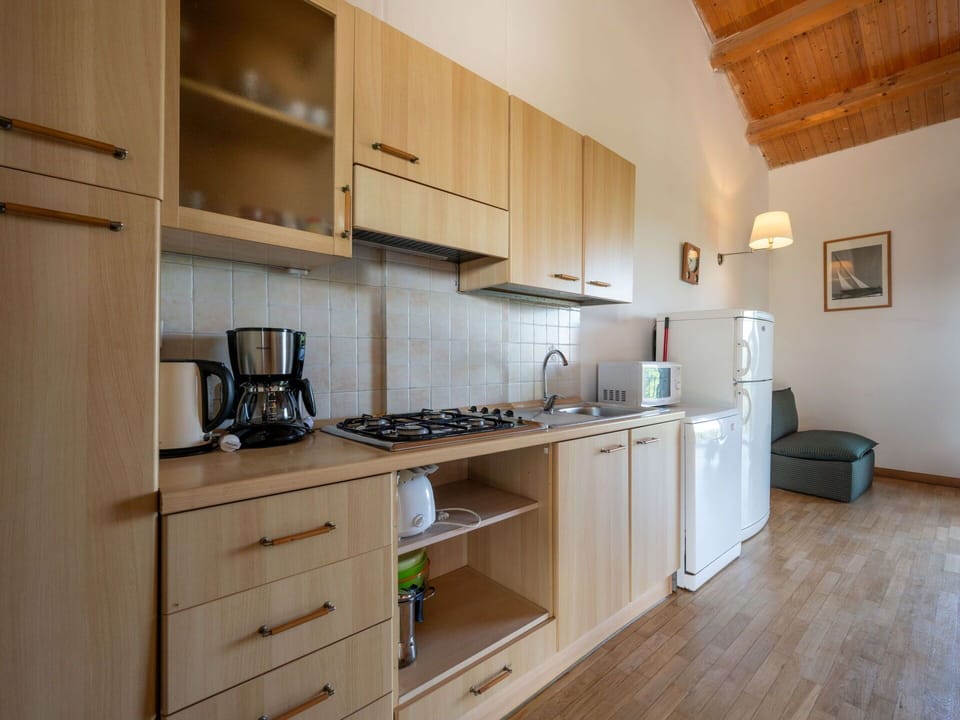 Flooring, Kitchen, Interior Design, Wood, Furniture, Kitchen Appliance, Major Appliance, Floor, Ceiling, Countertop