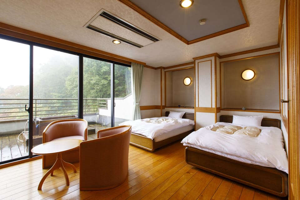 Twin Room, Top Floor | Hypo-allergenic bedding, down comforters, in-room safe, desk