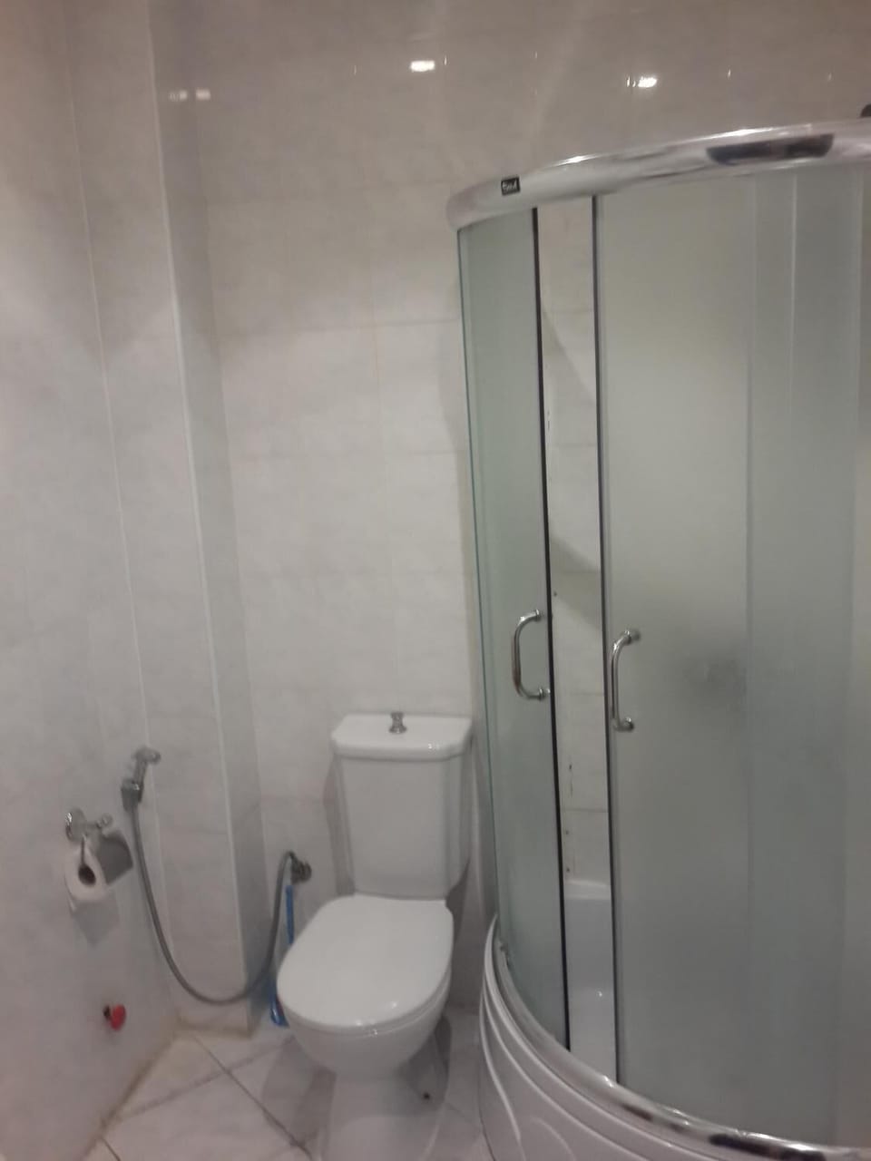 Shower, free toiletries, slippers, towels