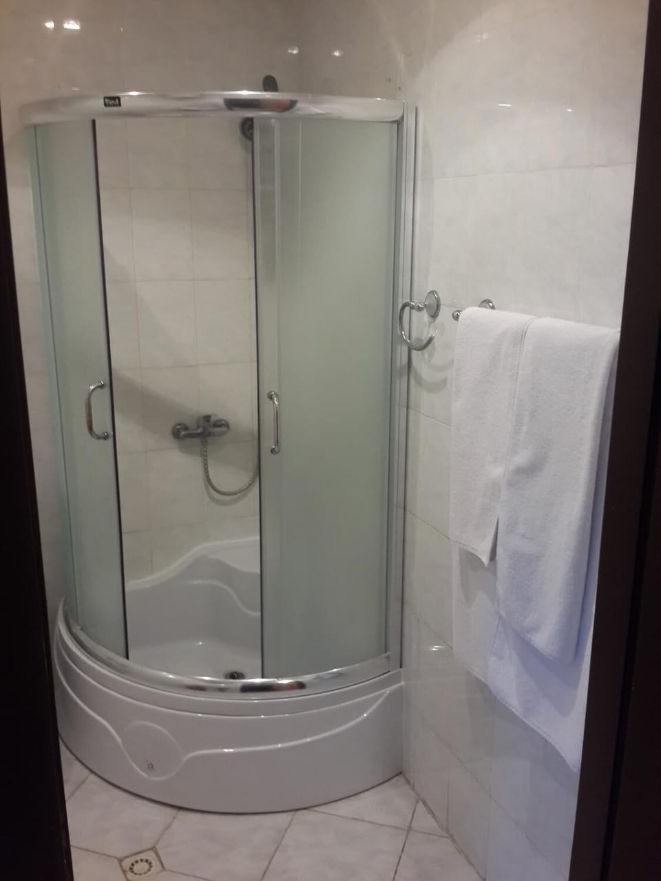 Shower, free toiletries, slippers, towels
