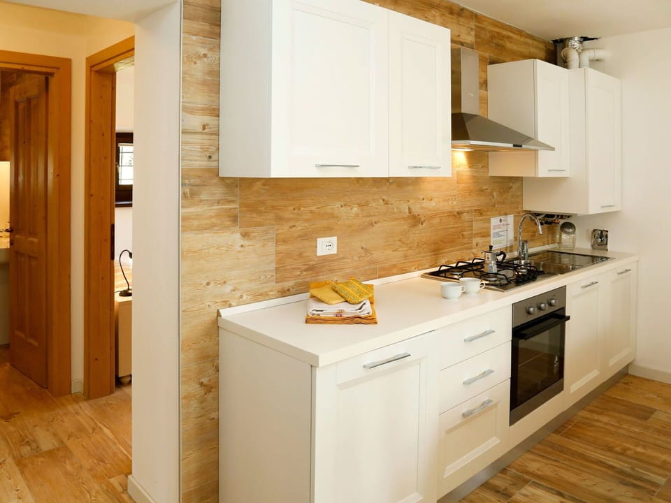 Cabinetry, Building, Furniture, Countertop, Kitchen Stove, Kitchen Appliance, Kitchen, Wood, Interior Design, Drawer