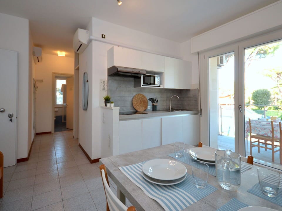 Table, Furniture, Cabinetry, Chair, Wood, Tableware, Countertop, Interior Design, Architecture, Kitchen