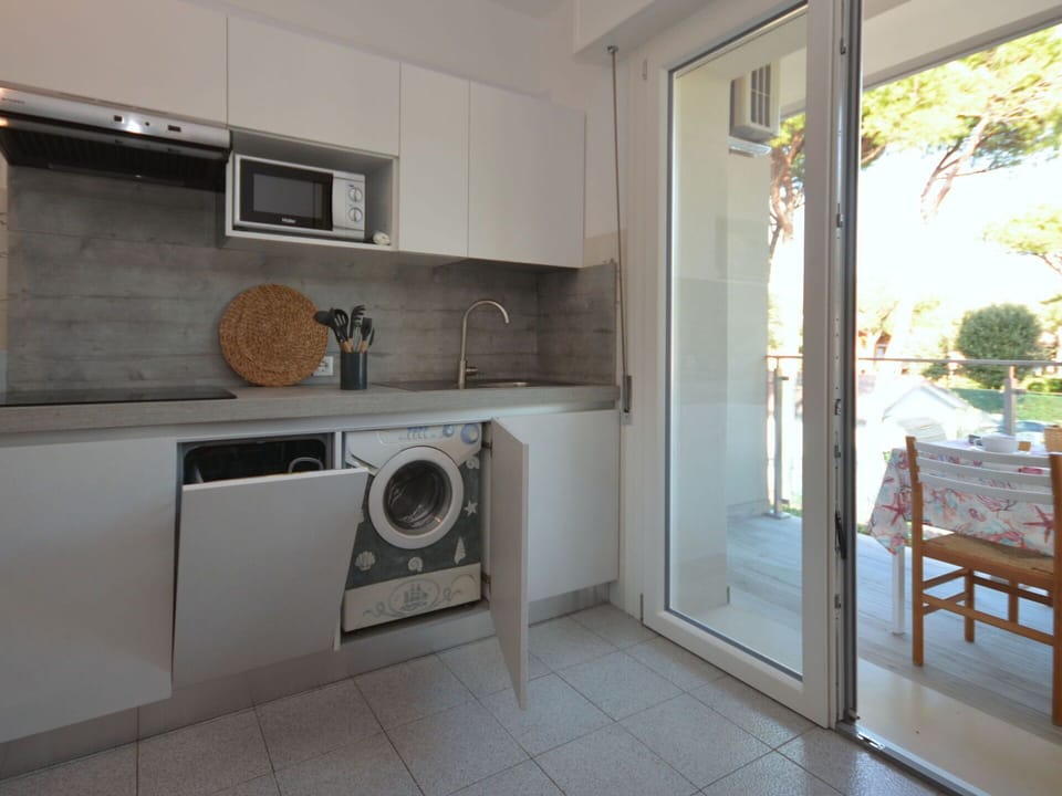 Laundry Room, Kitchen Appliance, Home Appliance, Wood, Washing Machine, Kitchen, Kitchen Stove, Clothes Dryer, Interior Design, Flooring