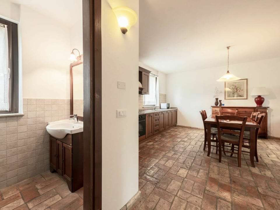 Sink, Property, Plumbing Fixture, Mirror, Table, Wood, Chair, Bathroom, Picture Frame, Interior Design