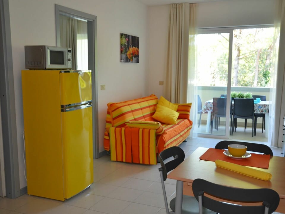 Room, Yellow, Orange, Property, Furniture, Interior Design, Floor, Building, House, Living Room