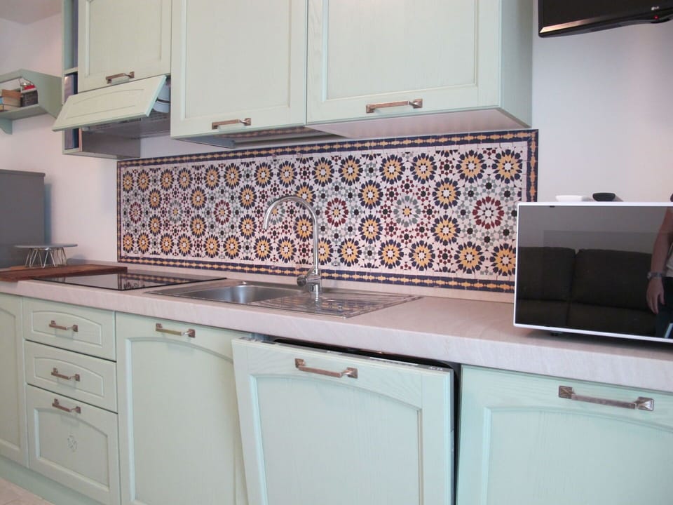 Kitchen, Countertop, Interior Design, Flooring, Cabinetry, Tap, Floor, Kitchen Appliance, Major Appliance, Tile