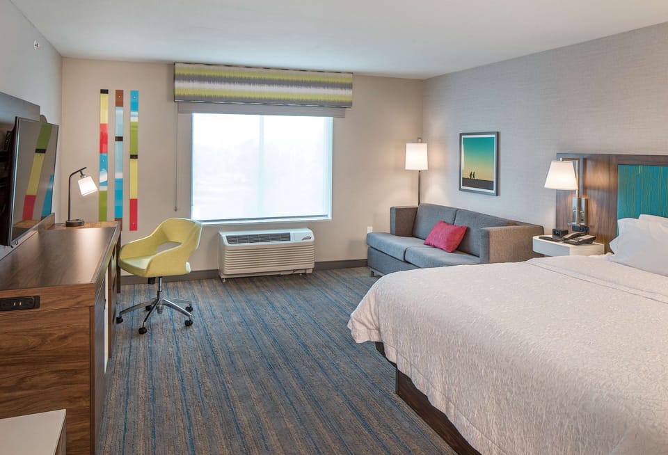 Room, 1 King Bed with Sofa bed, Refrigerator & Microwave | In-room safe, desk, laptop workspace, blackout drapes