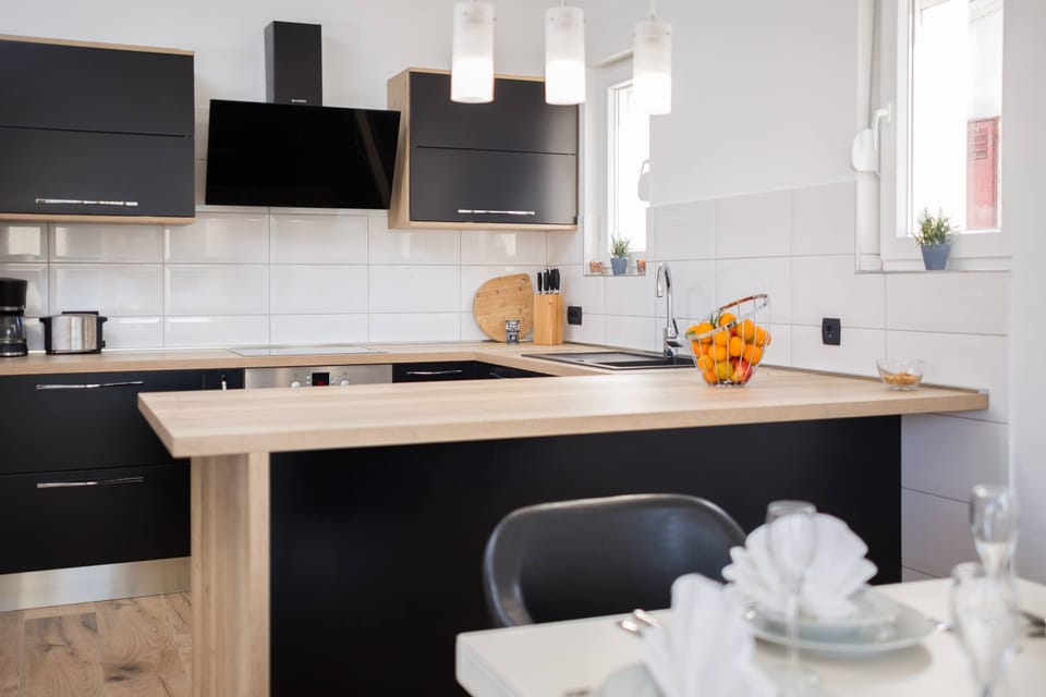 Villa, Beachfront | Private kitchen | Coffee/tea maker, full-size fridge, microwave, oven
