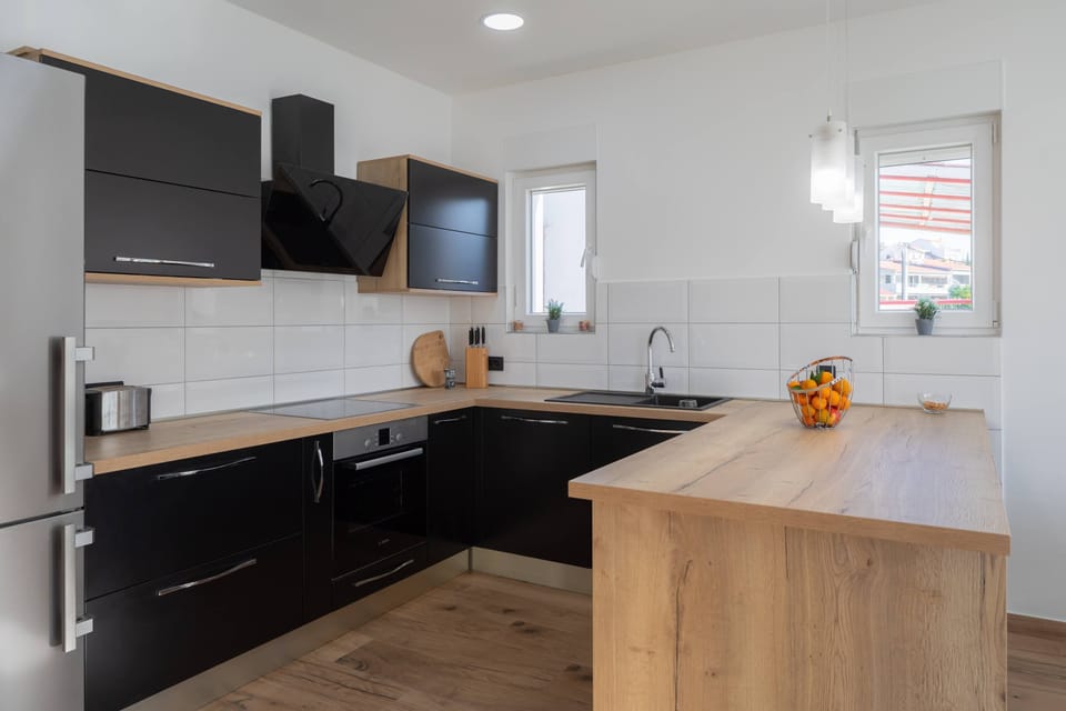 Villa, Beachfront | Private kitchen | Coffee/tea maker, full-size fridge, microwave, oven