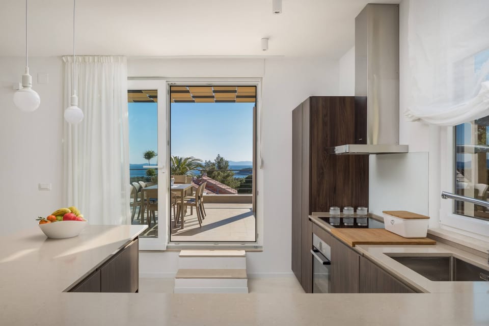 Villa, 4 Bedrooms | Private kitchen | Fridge, microwave, oven, stovetop