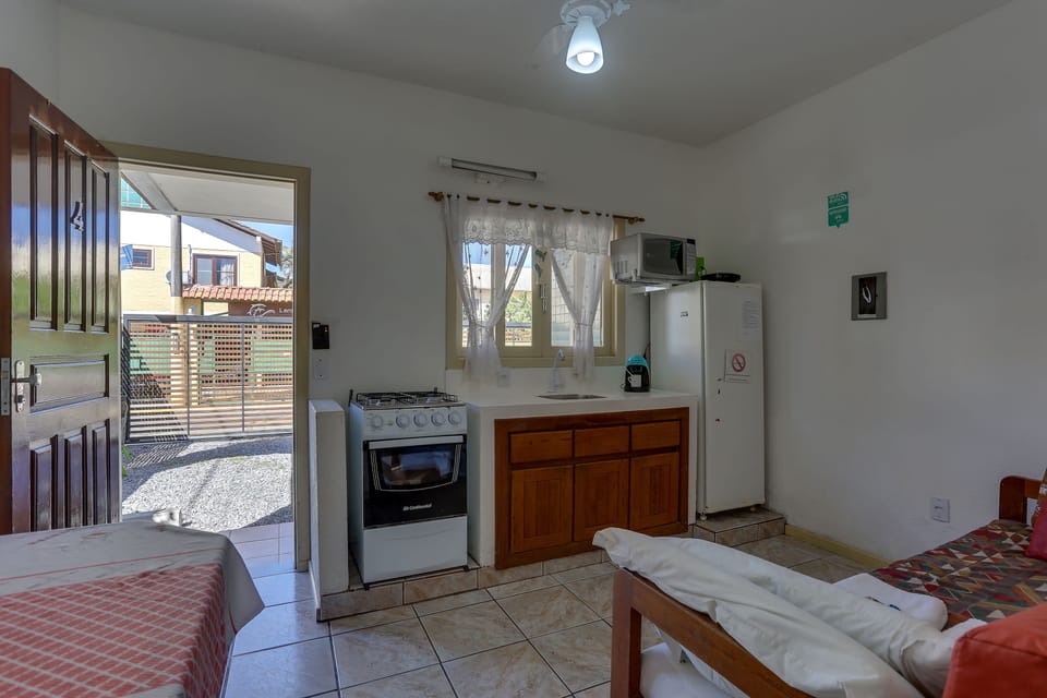 Classic Apartment | Private kitchen | Fridge, microwave, oven, stovetop