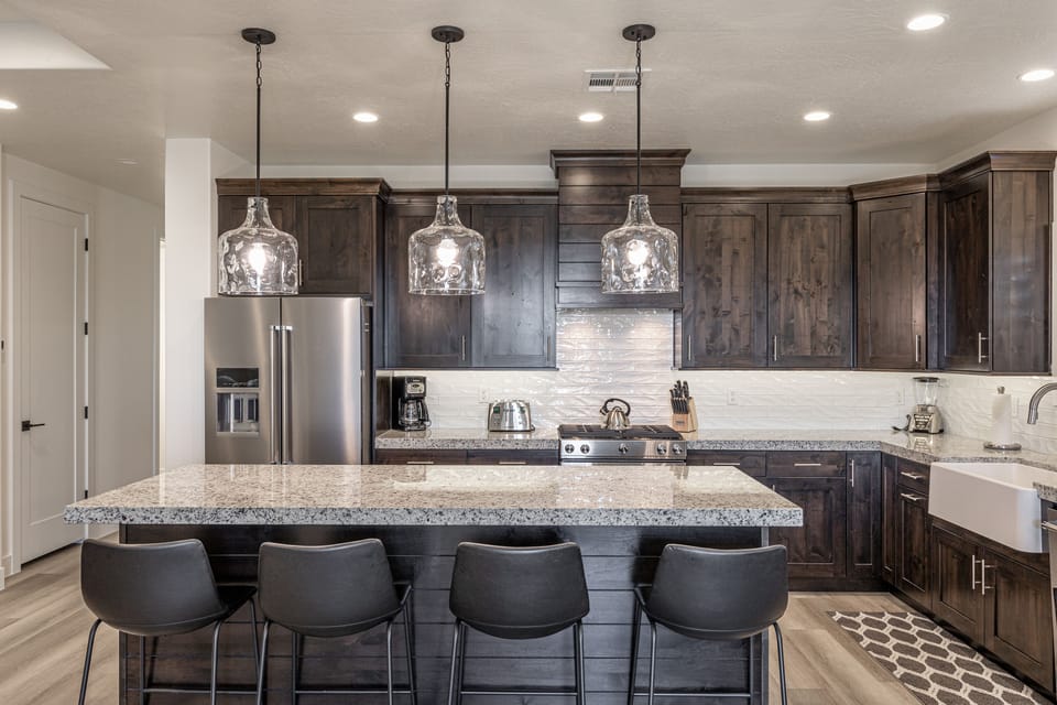 Kitchen Island - The Kitchen Island comfortably seats 4 adults and creates a great space for serving and preparing meals.
