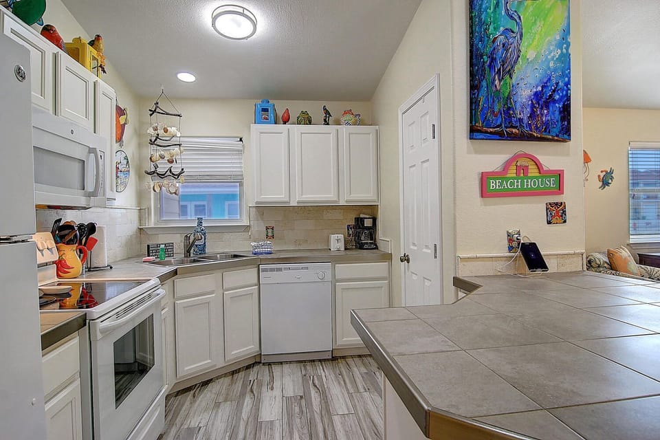 Your fully equipped kitchen awaits with everything you need to create memorable meals together - from morning coffee to evening feasts.