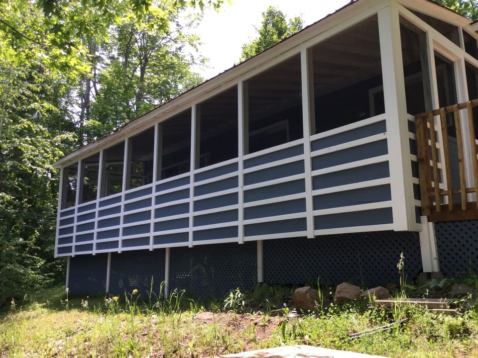The Front of the cottage/screened in porch. 