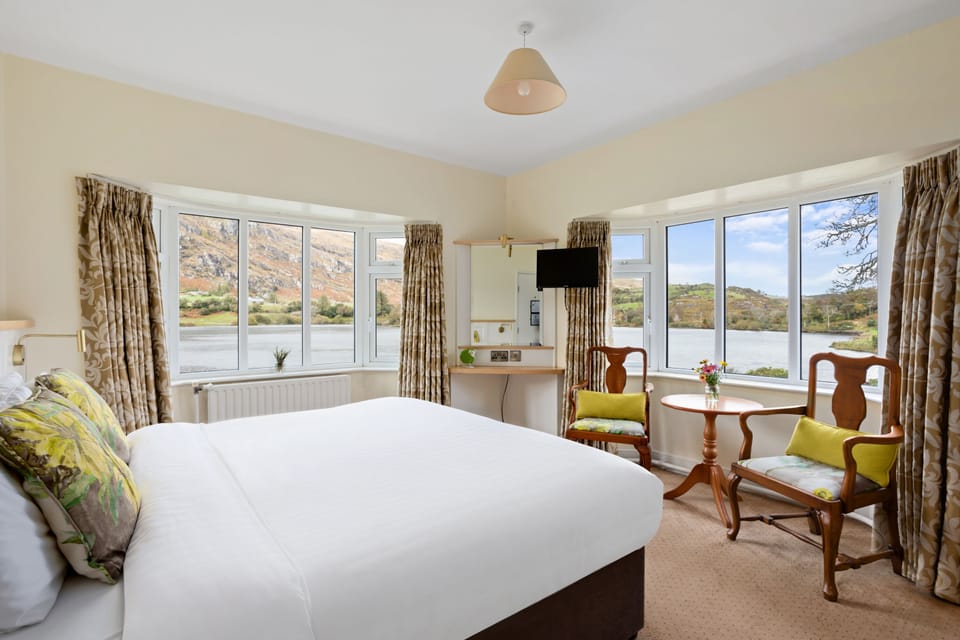 Premium Double Room | Iron/ironing board (on request), bed sheets