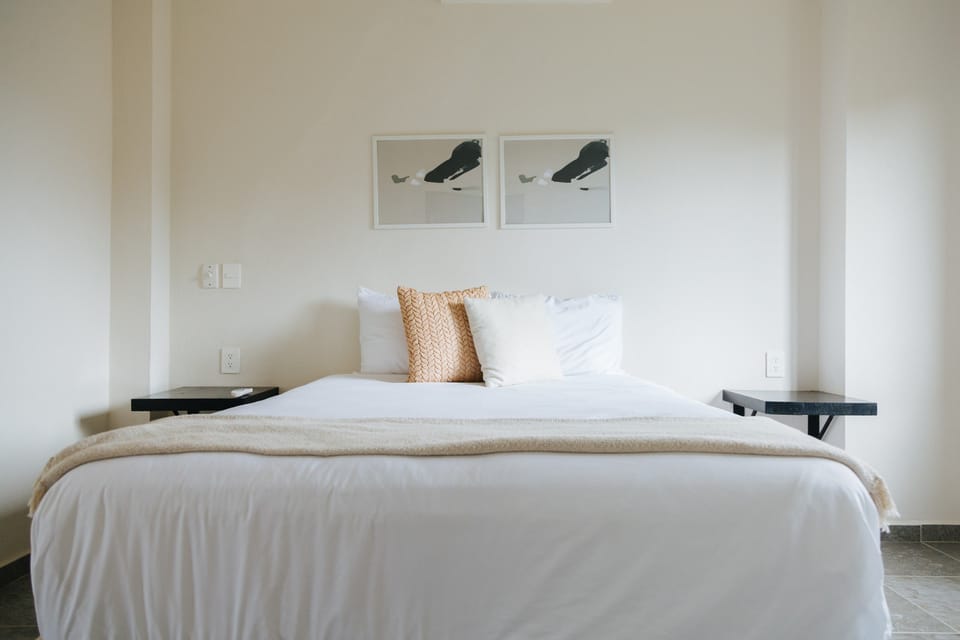 Drift to sleep in a comfortable bed after a day outside.