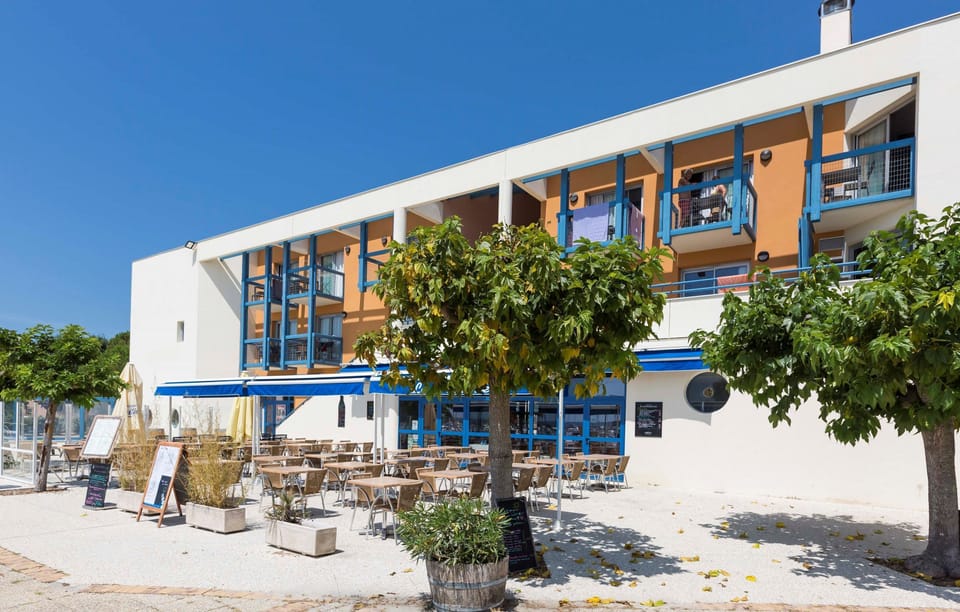 The residence buildings are built around the lovely outdoor pool