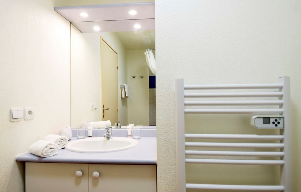 Bright bathrooms are refreshing after a day of adventure.